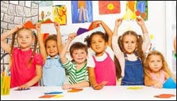 The figure above is a photograph showing kindergarten children.