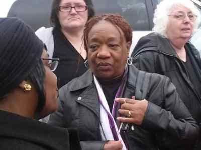 After Rev. Pinkney’s sentencing on Dec. 15, his wife, Dorothy Pinkney, a longtime activist in her own right, discusses with other supporters how to move forward. – Photo: Abayomi Azikiwe