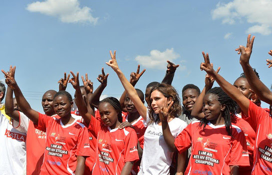 Victoria Beckham with the girls team at the launch of the national football campaign Maisha Kick Out HIV Stigma