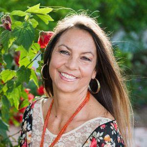 Photo of author Dina Gilio-Whitaker