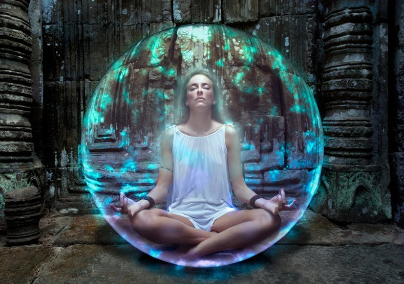 Woman-meditating-in-ball-of-energy4