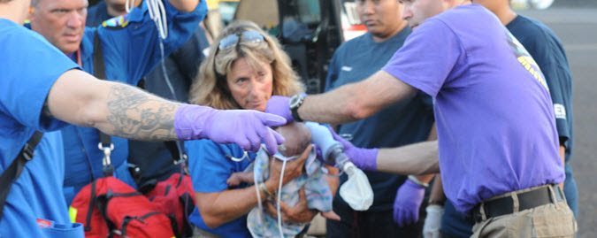 DMAT personnel evacuating an infant in America Samoa
