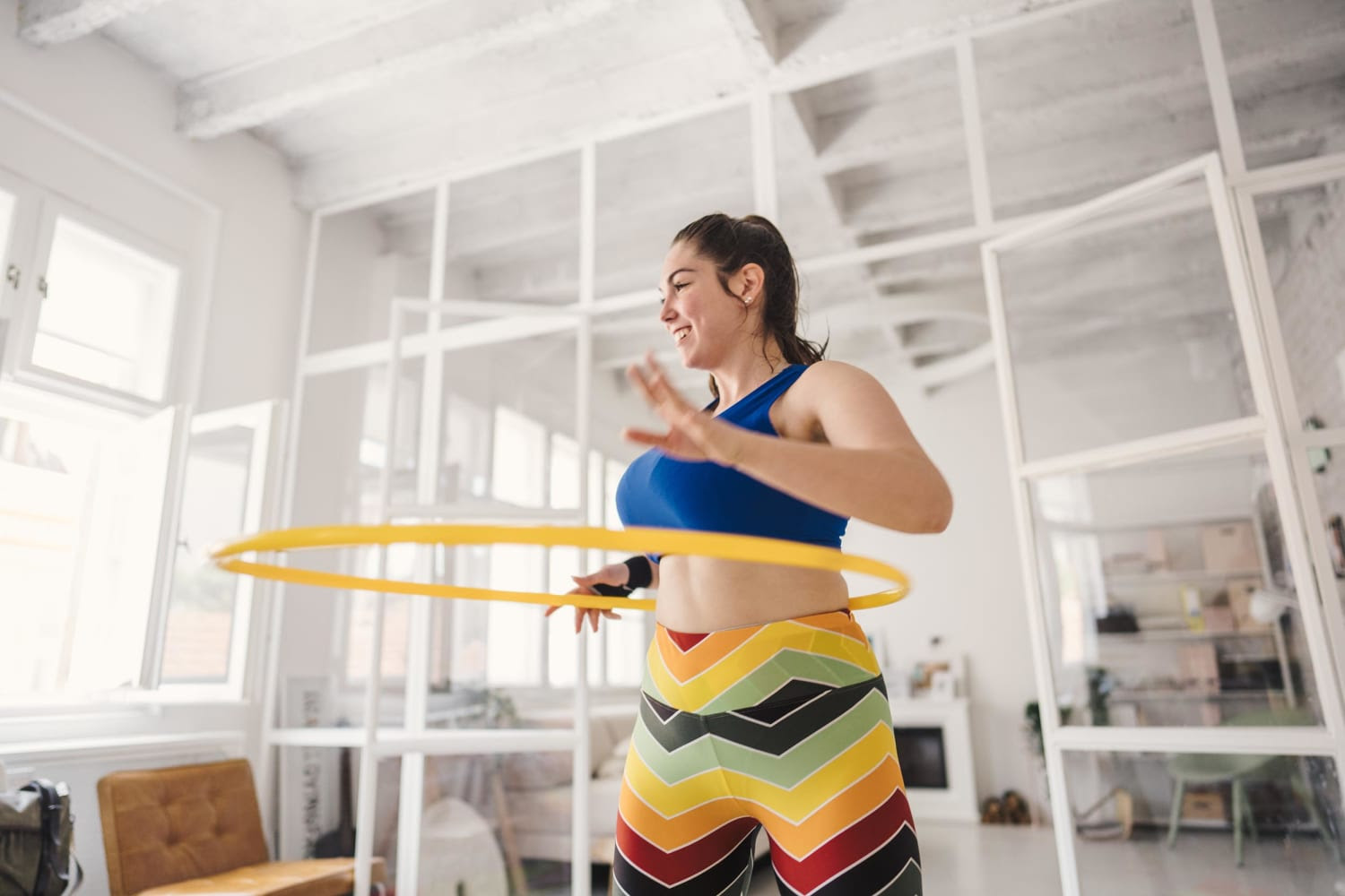 Embrace your inner child and get an underrated aerobic workout by picking up a hula hoop for the first time since that fourth-grade pool party Hoola-hoop-spandex-mc-230829-86e274