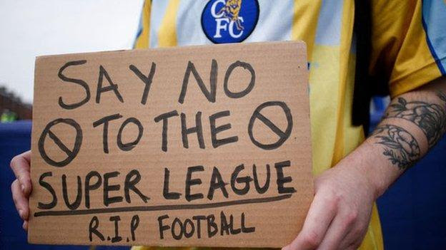 A Chelsea fan protests outside Stamford Bridge