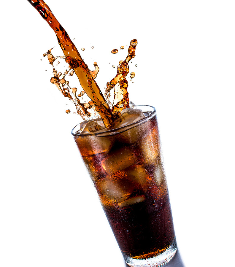 Cola drink splash with ice cube on white background