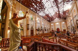 Officials inspect the damaged St. Sebastian's Church after multiple explosions targeting churches and hotels across Sri Lanka on April 21, 2019 in Negombo, north of Colombo, Sri Lanka