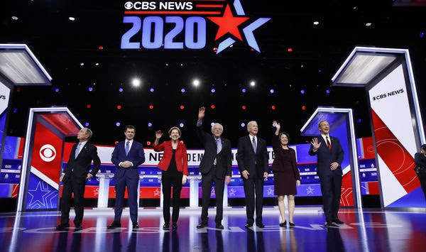 From left, Democratic presidential candidates, former New York City Mayor Mike Bloomberg, former South Bend Mayor Pete Buttigieg, Sen. Elizabeth Warren, D-Mass., Sen. Bernie Sanders, I-Vt., former Vice President Joe Biden, Sen. Amy Klobuchar, D-Minn., and businessman Tom Steyer participate in a Democratic presidential primary debate, Tuesday, Feb. 25, 2020, in Charleston, S.C. (AP Photo/Matt Rourke)