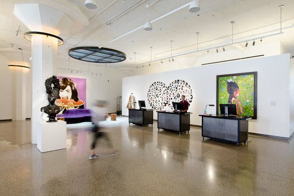 The check-in area at the 21c Museum Hotel in Oklahoma City surrounded by the Pop Stars! Popular Culture and Contemporary art exhibit. The exhibit is now at the Lexington property.