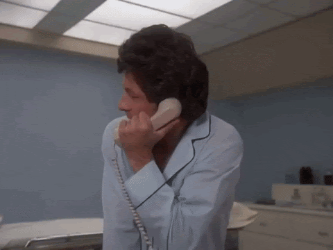 A GIF of David Banner from TV series "The Incredible Hulk," trying not to turn into the Hulk while on the phone.