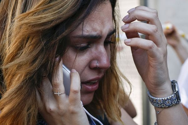 A woman cries after a vehicular attack on Las&nbsp;Ramblas in Barcelona on Aug.&nbsp;17. (Pau Barrena/Agence France-Presse via Getty Images)</p>
