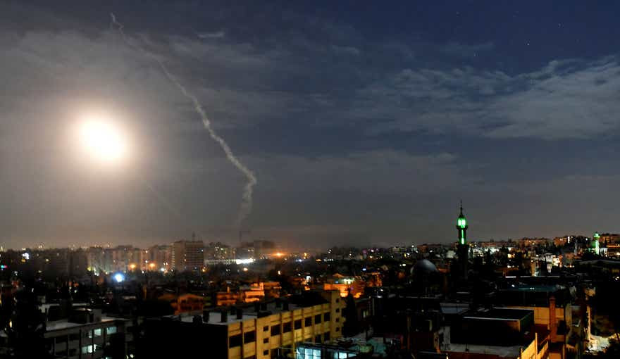Missiles flying into the sky near international airport, in Damascus, Syria, 2019.