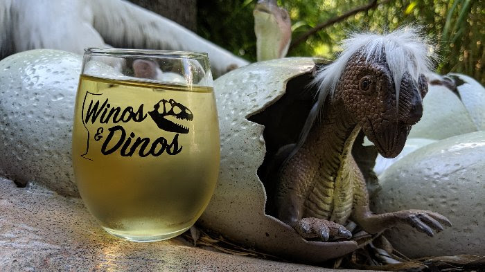 Dinosaur and glass of wine at Reptiland's Winos & Dinos event