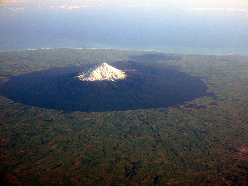 mount taranaki volcano from an airplane aerial from above