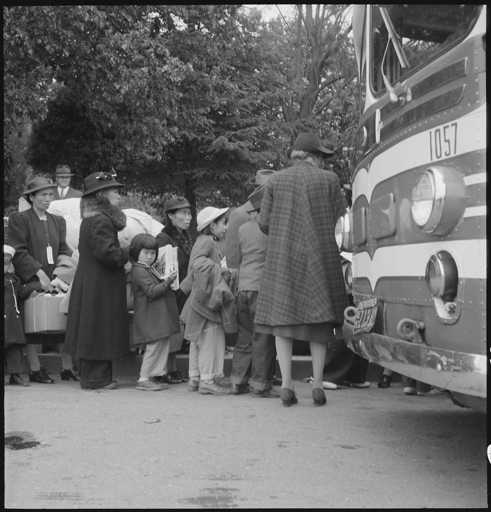 http://upload.wikimedia.org/wikipedia/commons/thumb/f/fc/Hayward%2C_California._Farm_families_of_Japanese_ancestry_are_being_checked_into_the_evacuation_buses_._._._-_NARA_-_537521.tif/lossy-page1-981px-Hayward%2C_California._Farm_families_of_Japanese_ancestry_are_being_checked_into_the_evacuation_buses_._._._-_NARA_-_537521.tif.jpg