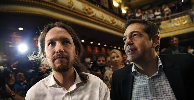 Pablo Iglesias y Alexis Tsipras, en un acto de Podemos en Madrid, en 2014.- REUTERS