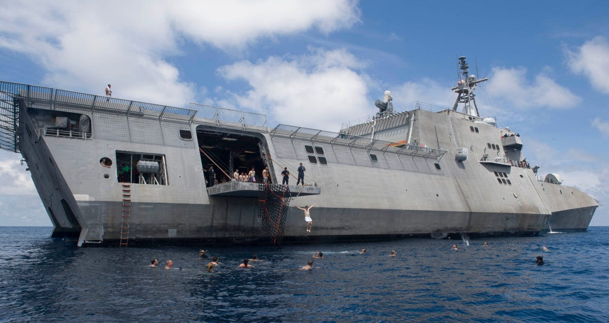 The US Navy may be the most professional in the world, with a very serious mission in the South China Sea, but they still make time for a swim on one of the US's newest combat ships, the USS Coronado.
