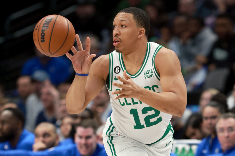 DALLAS, TEXAS - JANUARY 05: Grant Williams #12 of the Boston Celtics passes the ball against the Dallas Mavericks in the second half at American Airlines Center on January 05, 2023 in Dallas, Texas. NOTE TO USER: User expressly acknowledges and agrees that, by downloading and or using this photograph, User is consenting to the terms and conditions of the Getty Images License Agreement. (Photo by Tom Pennington/Getty Images)