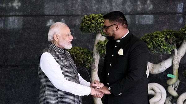 Prime Minister Narendra Modi welcomes the President of Guyana Dr Mohamed Irfaan Ali at the 17th Pravasi Bharatiya Divas, in Indore on Monday. (ANI)