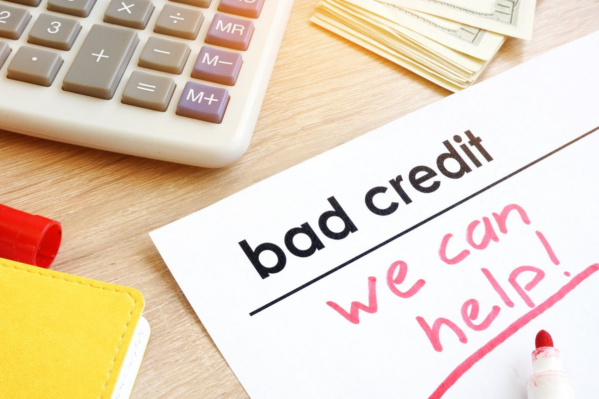 Bad credit we can help written on a piece of paper