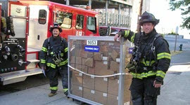 photo of first responders unloading Chem packs from SNS