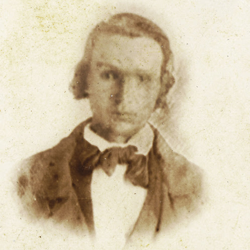 Portrait of a young man in Civil War-era garb.