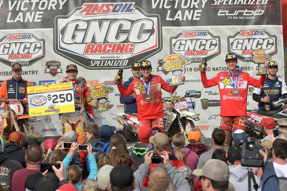 The 2019 top three Steele Creek GNCC overall finishers were: Thad Duvall (center), Kailub Russell (left) and Trevor Bollinger (right). 