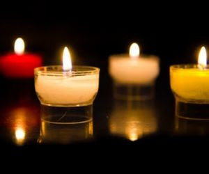 Four lit candles
