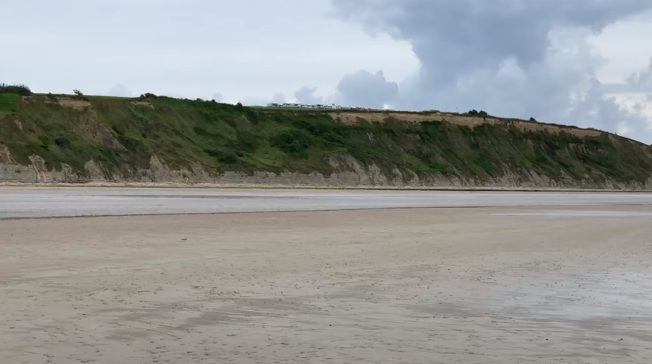 6.7.19 Normandy Beach Video Freeze.png