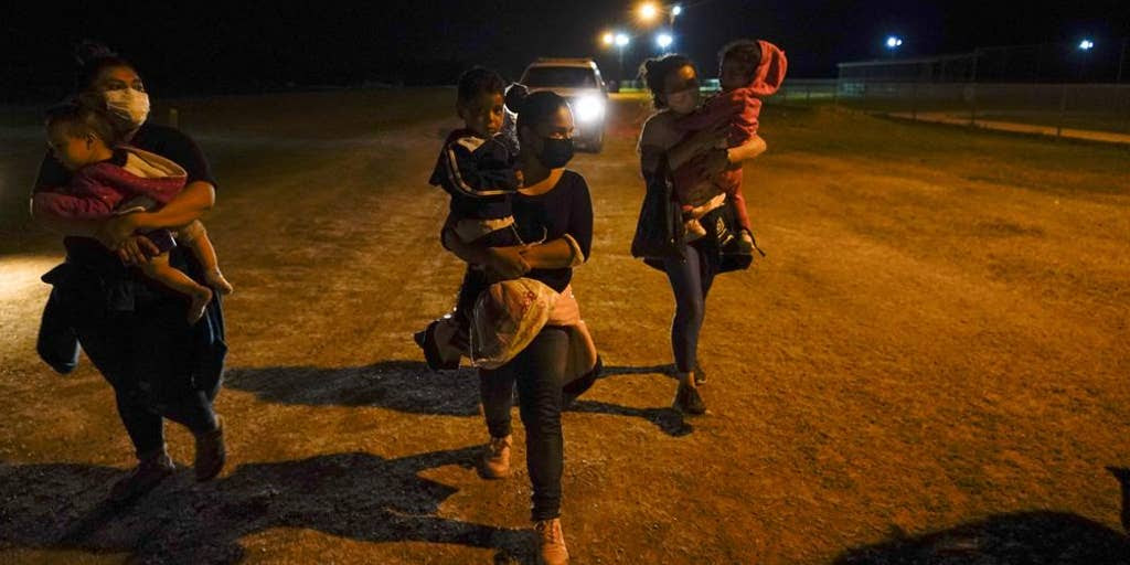 People crossing the border at night People crossing the border at night