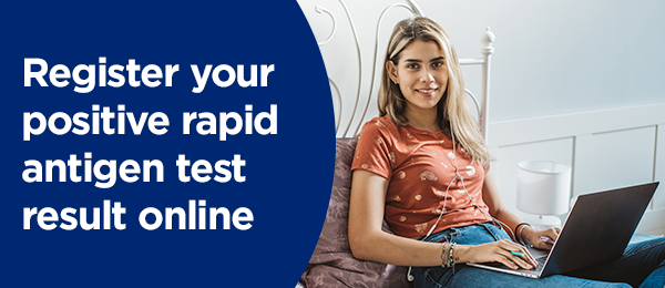 woman registering her positive RAT test online with Service NSW
