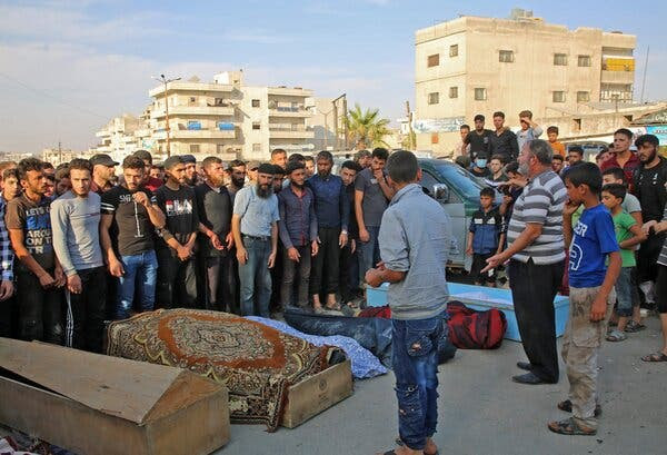 A funeral service in Idlib, Syria, on Monday for 10 fighters from Faylaq al-Sham, the Turkish-backed group targeted in the strikes.