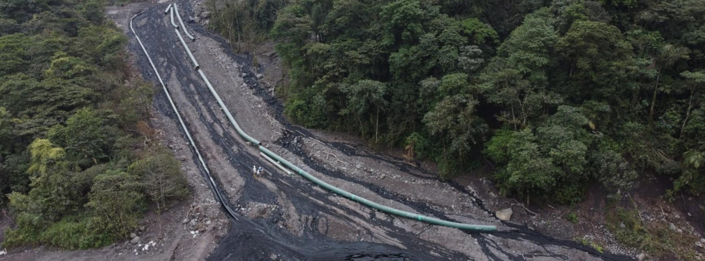image of ruptured crude oil pipeline and oil spill in Ecuador, Amazon