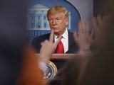 As reporters raise their hands, President Donald Trump pauses as he speaks about the coronavirus in the press briefing room at the White House, Saturday, Feb. 29, 2020, in Washington. (AP Photo/Carolyn Kaster)