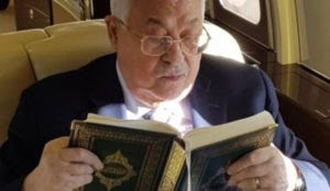 Fatah publishes photo of Abbas reading Qur’an on $50 million private jet while his people supposedly starve