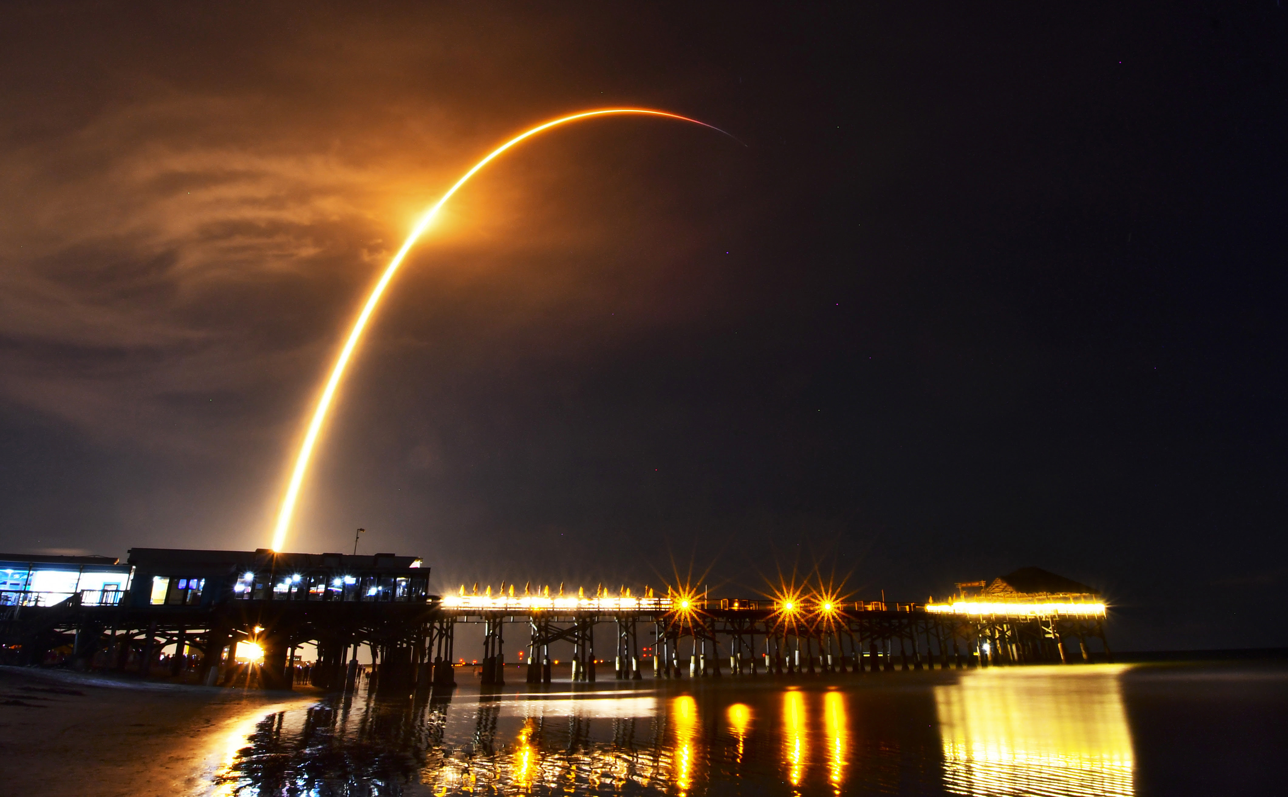 A SpaceX Falcon 9 rocket is pictured from Cocoa Beach, Fla,. as it launches from Launch Complex 40 at Cape Canaveral Space Force Station, Fla., Sunday, Sept., 4, 2022.