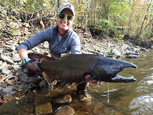 Angler with Chinook salmon