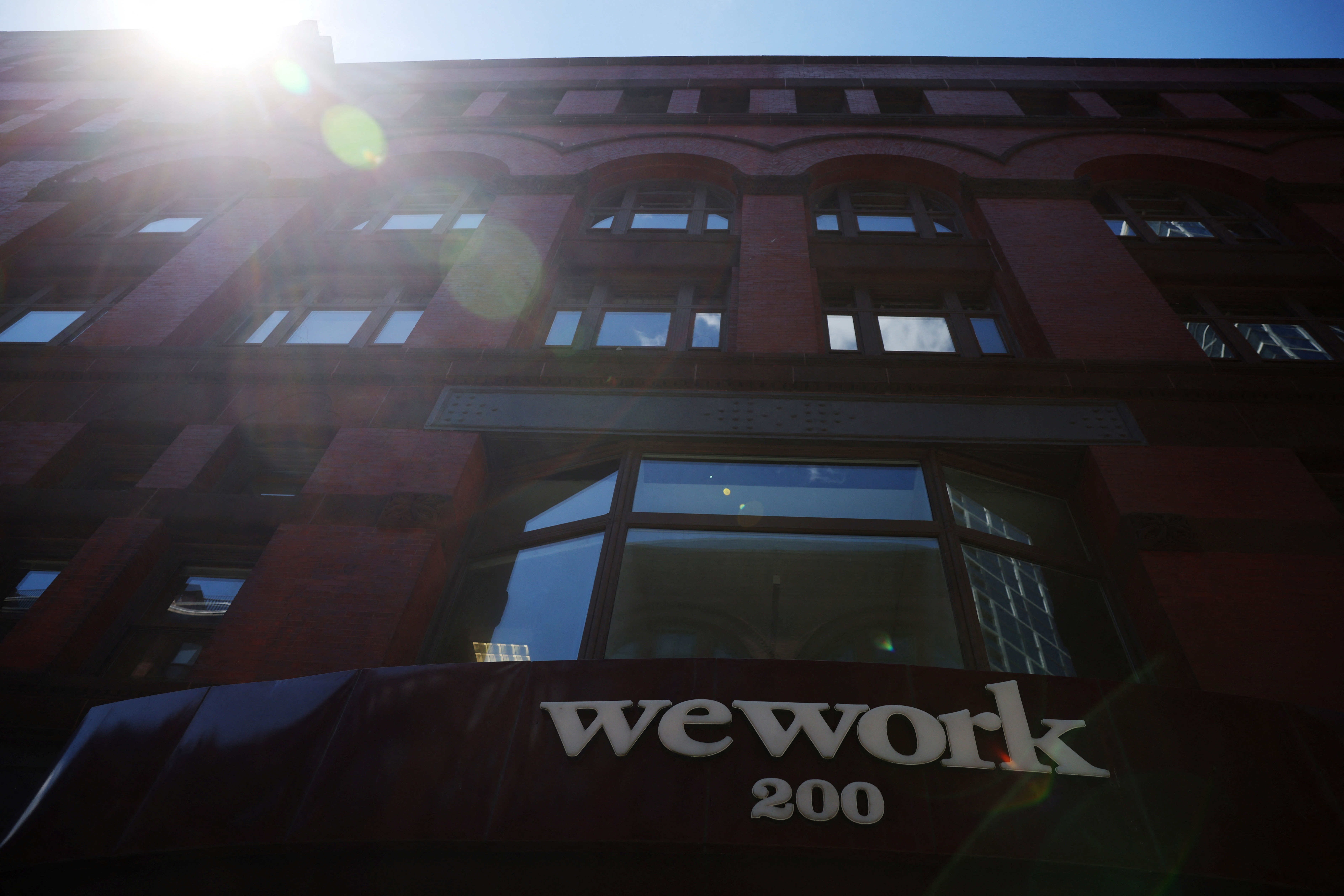 A sign marks a WeWork location in Boston