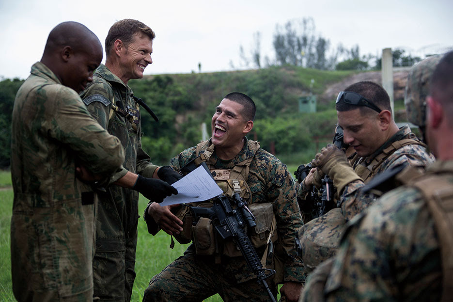 U.S. Marines with Golf Company, 23rd Marine Regiment, 4th Marine Division, Marine Forces Reserve, sign roster alongside Brazilian marine corps during UNITAS Amphibious 2015, Ilha do Governador, Brazil, November 16, 2015 (U.S. Marine Corps/Issac Velasquez)