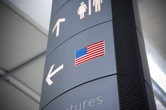 A direction sign at the airport.