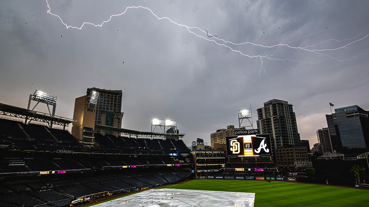 Lightning strikes over a ballpark