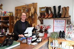 Person next to a cash register