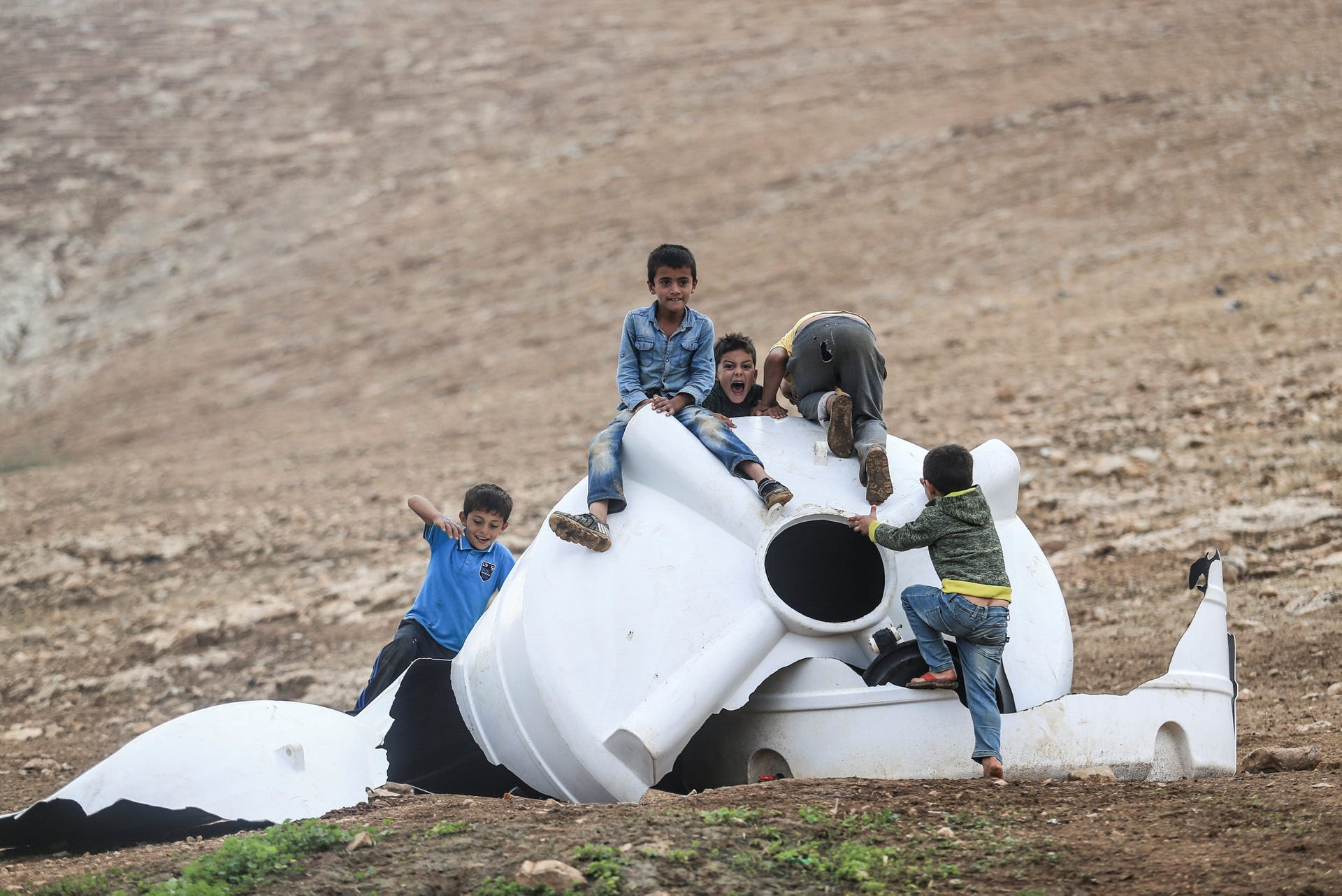 Children play in the ruins of Khirbet Humsa after its demolition, November 2020.