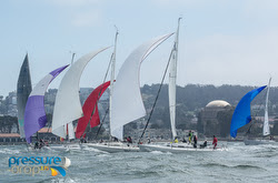 J/105s sailing off San Francisco city front