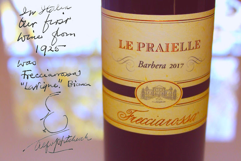 A bottle of Le Praielle Barbera dell'Oltrepo Pavese DOC 2017 by Frecciarossa with a tribute signed by Alfred Hitchcock