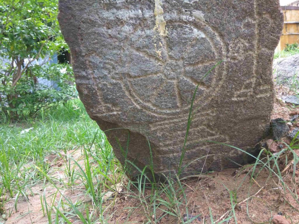 A dharma-chakra pillar in Enathur, Kanchi.