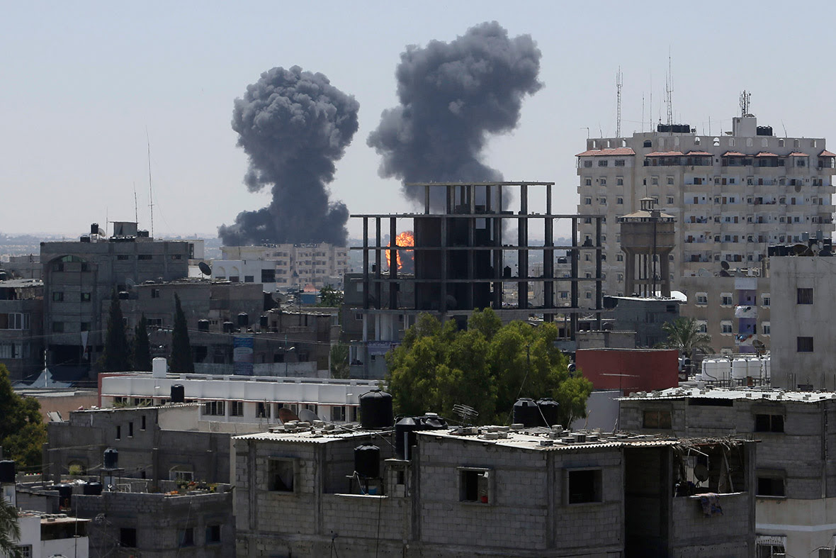Smoke and flames are seen following what witnesses said were Israeli air strikes in Rafah in the southern Gaza Strip