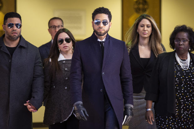 Actor Jussie Smollett, center, leaves the Leighton Criminal Courthouse in Chicago after prosecutors dropped all... Actor Jussie Smollett, center, leaves the Leighton Criminal Courthouse in Chicago after prosecutors dropped all charges against him on Tuesday, March 26, 2019.