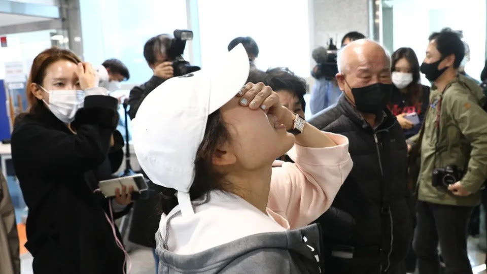 Relatives of missing people weep at a community service center on October 30, 2022 in Seoul, South Korea. 149 people have been reported killed and at least 150 others were injured in a deadly stampede in Seoul's Itaewon district, after huge crowds of people gathered for Halloween parties, according to fire authorities.