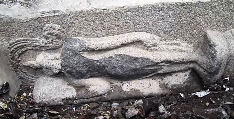 Ancient reclining Buddha (lost) in the compound wall of Ekambareswarar Temple, Kanchi.