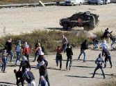 Masked Arabs clash with Israeli security forces in anti-Israel riot outside the Ofer prison between Jerusalem and Ramallah.